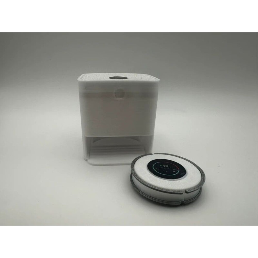 Miniature (non-working) robot vacuum